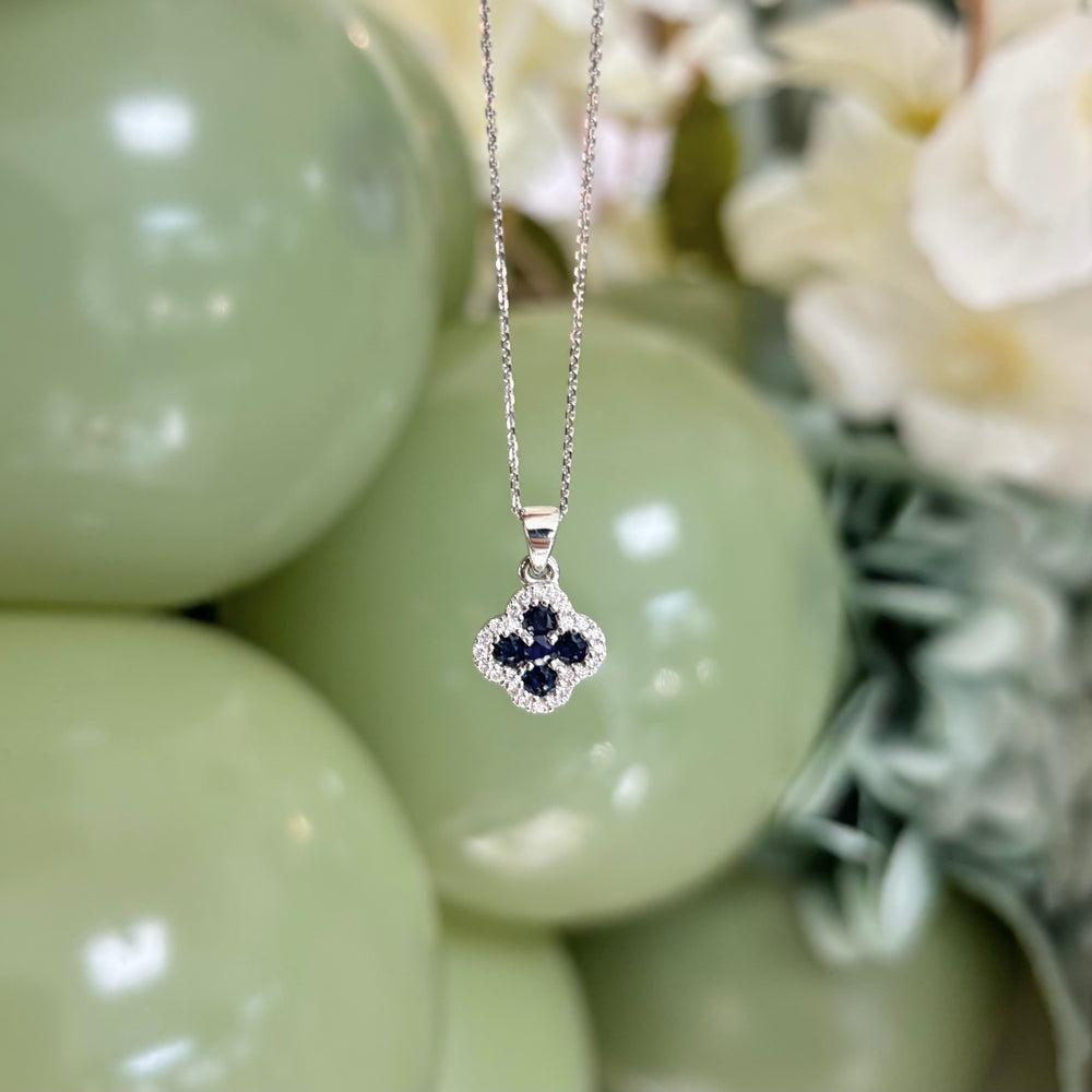 18ct White Gold, Sapphire and Diamond Flower Pendant and Chain.