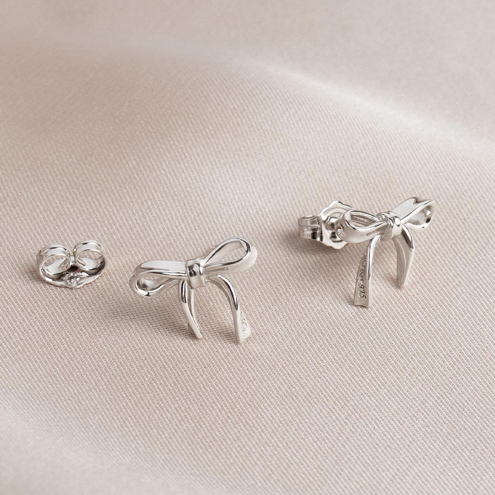 Kit Heath | Serenity Ribbon Bow Dainty Stud Earrings