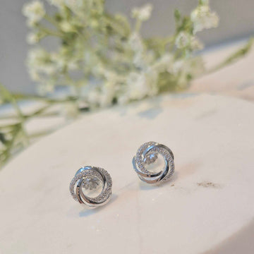 Real Effect | Sterling Silver CZ Knot Earrings