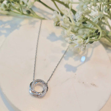 Real Effect | Sterling Silver CZ Knot Necklace