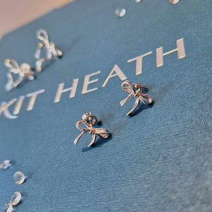 Kit Heath | Serenity Ribbon Bow Dainty Stud Earrings