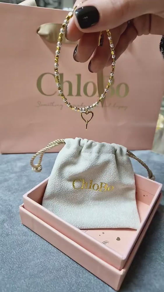 
            
                Load and play video in Gallery viewer, ChloBo | Gold and Silver Interlocking Love Heart Bracelet
            
        