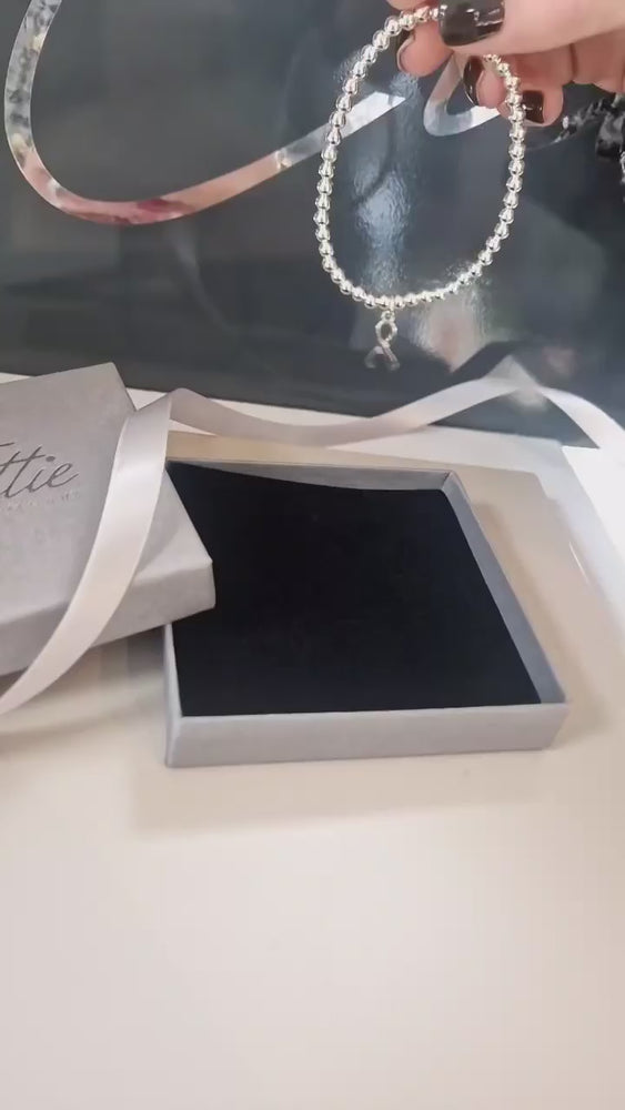 
            
                Load and play video in Gallery viewer, Ettie | Medium Bead Ribbon Bracelet
            
        