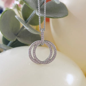 
            
                Load image into Gallery viewer, Real Effect | Sterling Silver Circle Necklace
            
        