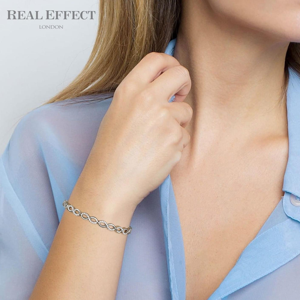 
            
                Load image into Gallery viewer, Real Effect | Sterling Silver Figure of 8 Bracelet
            
        
